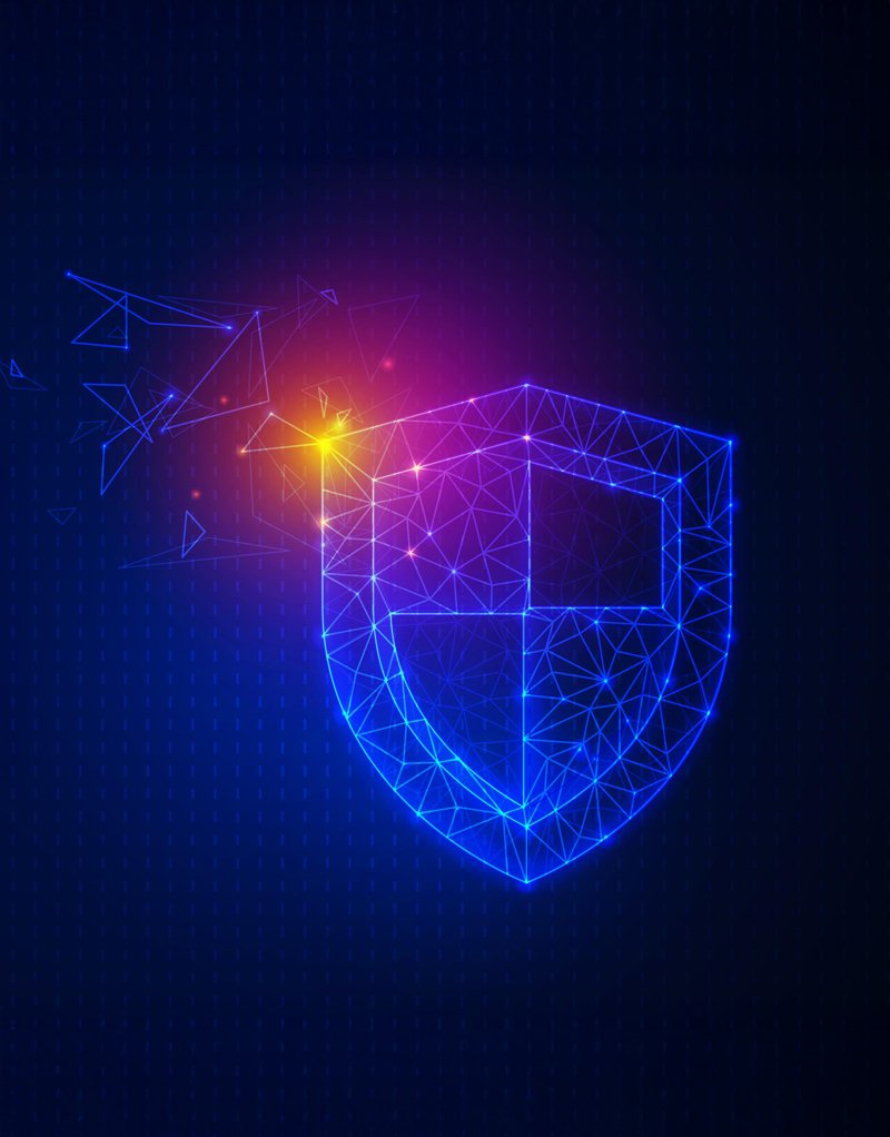Glowing wireframe shield breaking apart at one corner, representing a network perimeter under attack